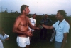 Oranjestad Crew, Match lost, Operator Pim Koeleveld receives consolation prize from Ch. Eng.  Ben Buurman 1985